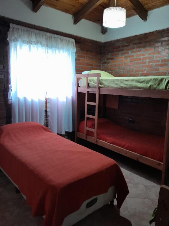 Postel nebo postele na pokoji v ubytování Posada Madre America