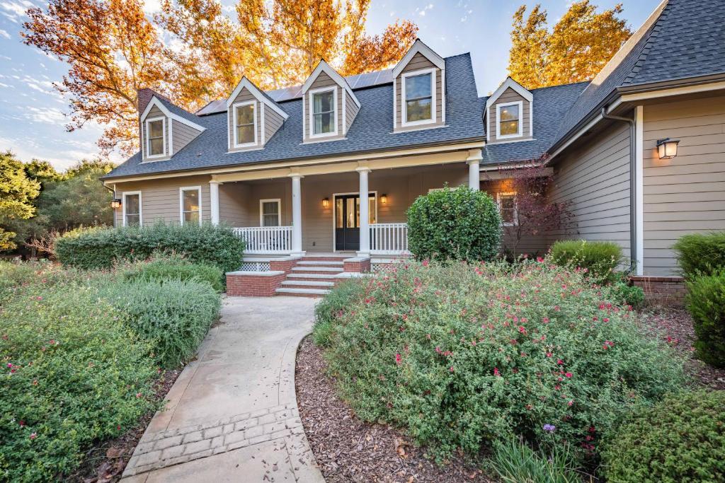 a house with a pathway in front of it at Sycamore Ranch in Templeton