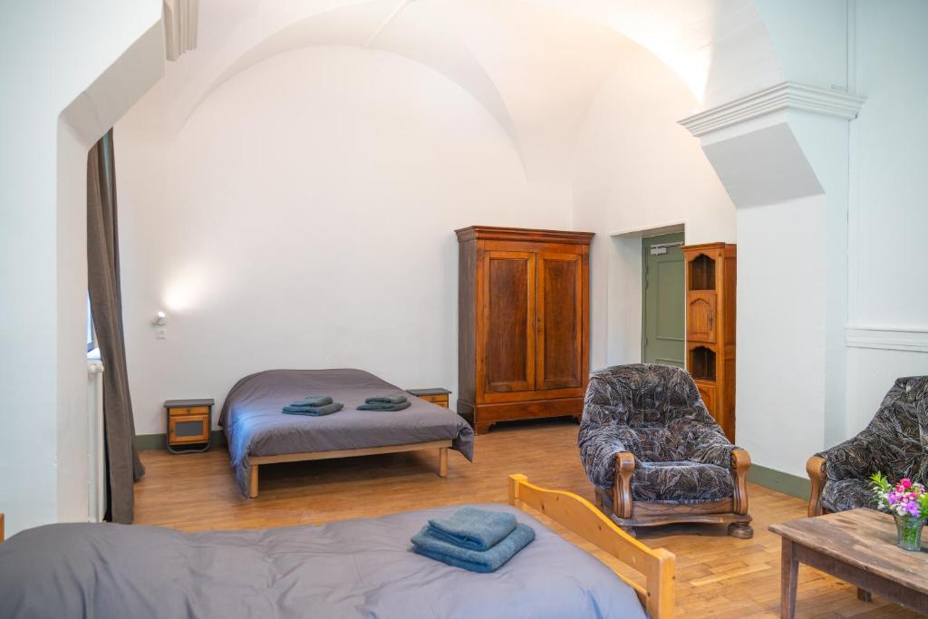 Postel nebo postele na pokoji v ubytování Monastère du Val de Consolation