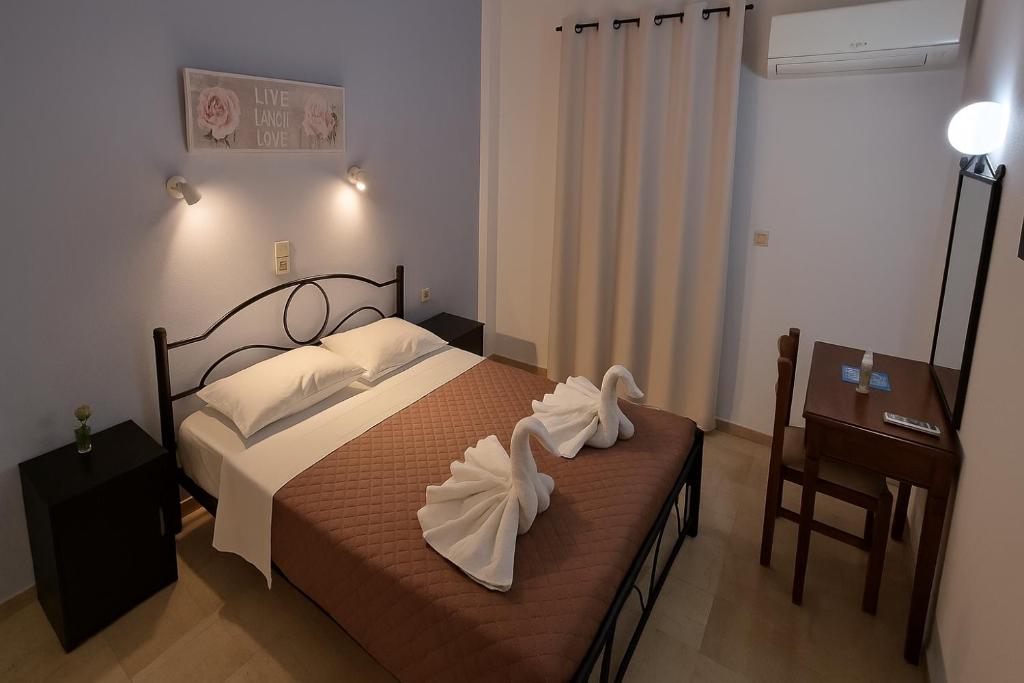 Postel nebo postele na pokoji v ubytování Corfu-Apartments4you