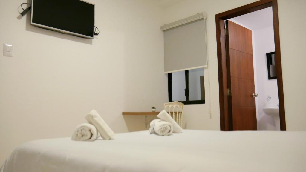 TV a/nebo společenská místnost v ubytování Park View Hostel & Suites