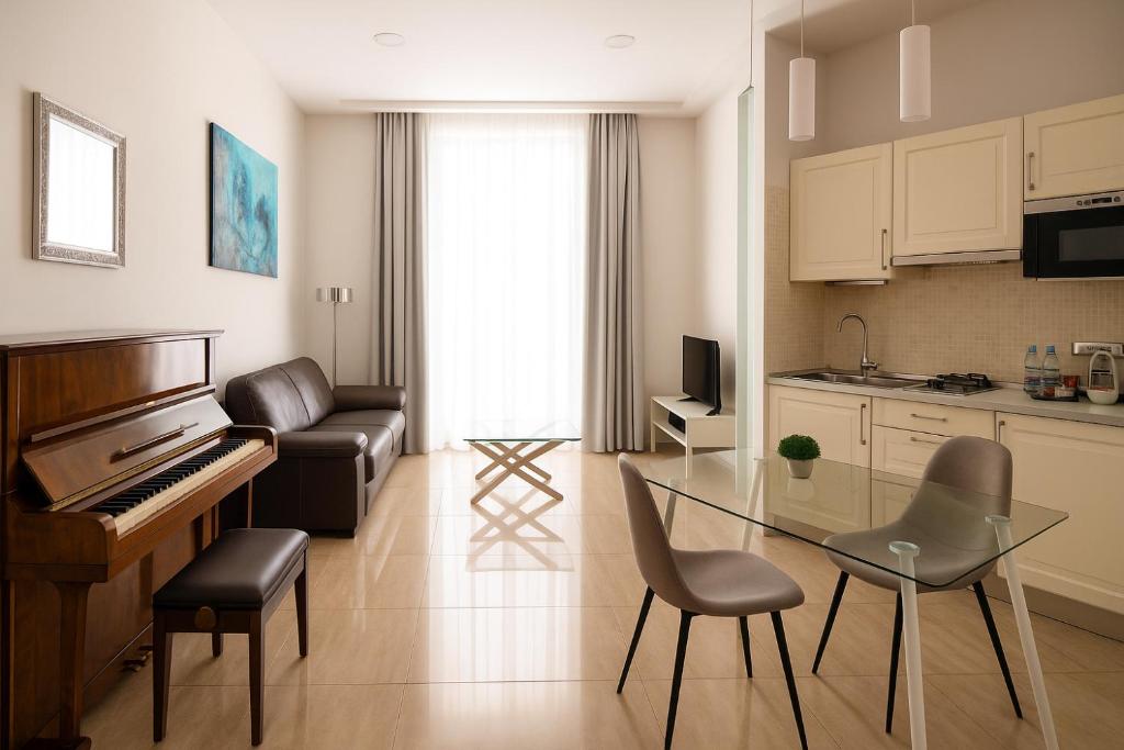 TV a/nebo společenská místnost v ubytování Sanfelice 33 Luxury Suites