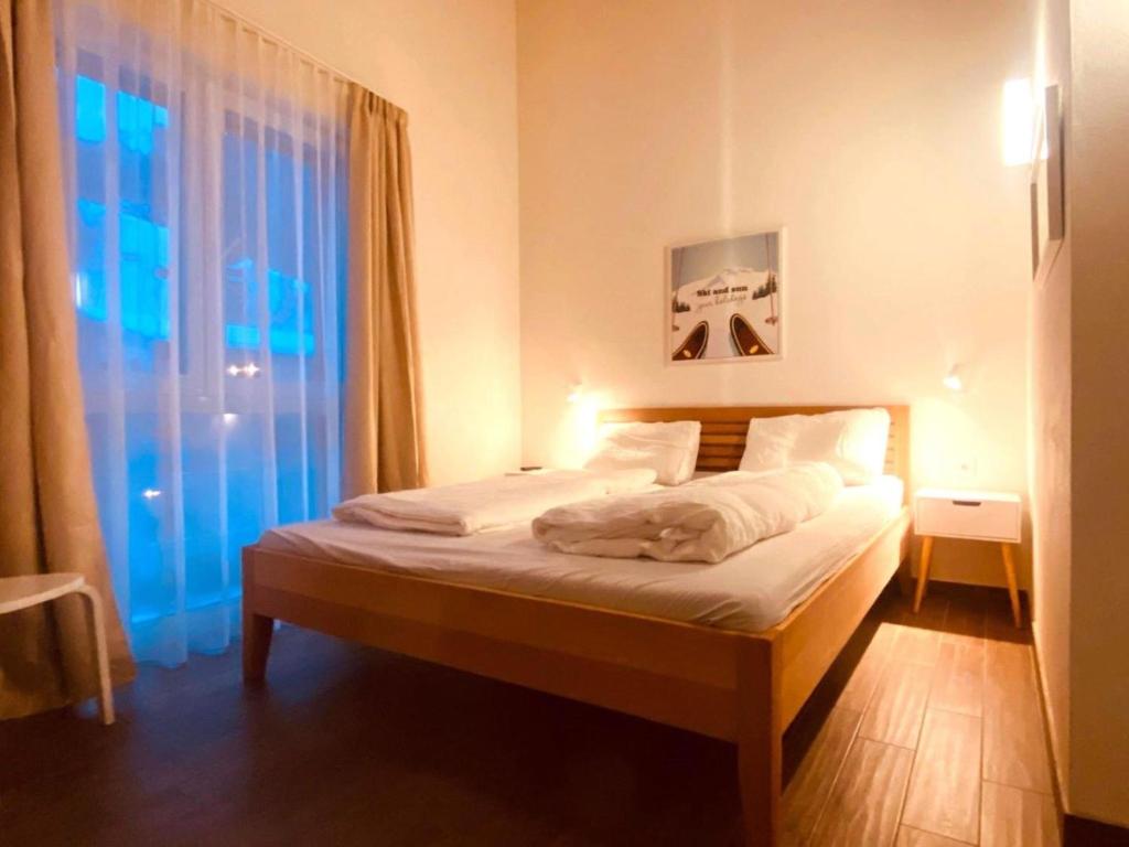 Postel nebo postele na pokoji v ubytování Emma Top 4