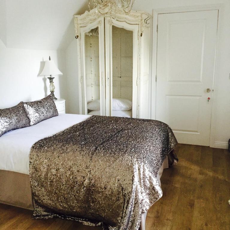 Postel nebo postele na pokoji v ubytování Harford en-suite Rooms