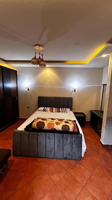 Postel nebo postele na pokoji v ubytování Porto Sokanha pyramids Apartments family