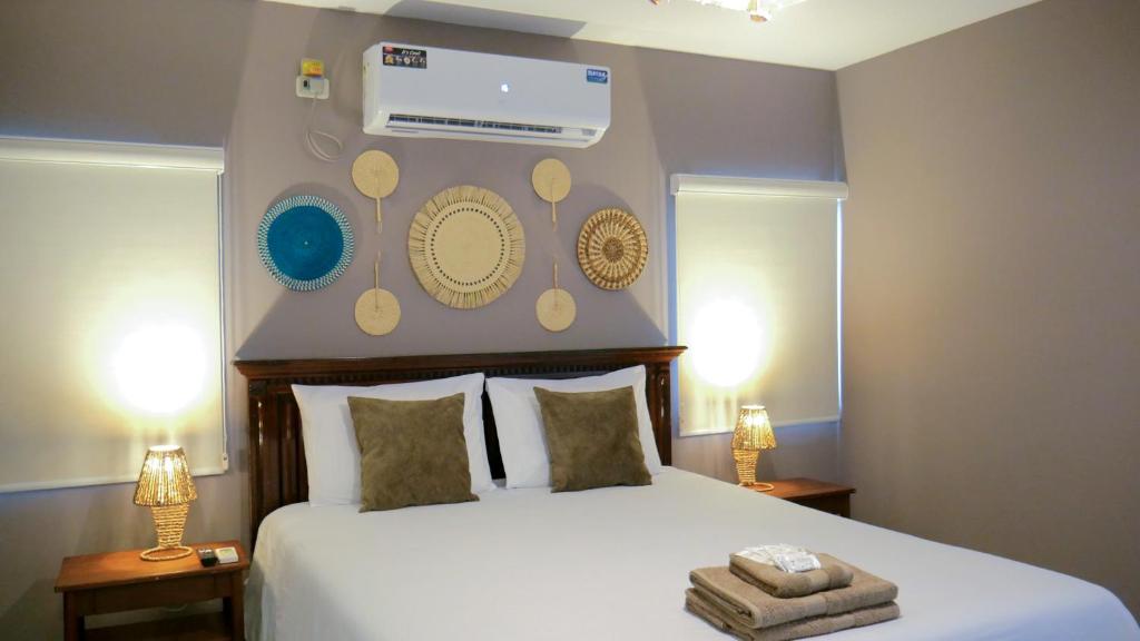 Postel nebo postele na pokoji v ubytování Park View Hostel & Suites