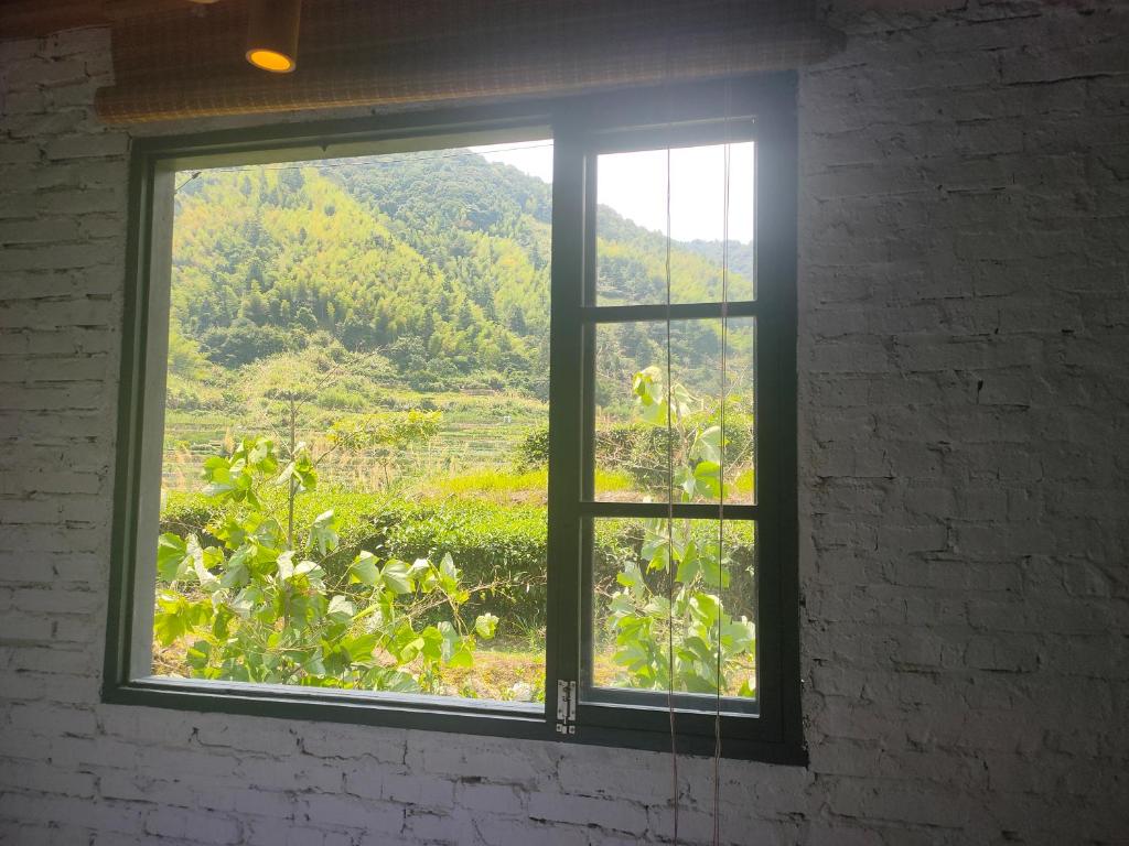 Zahrada ubytování Tulou Herongzhuang Inn