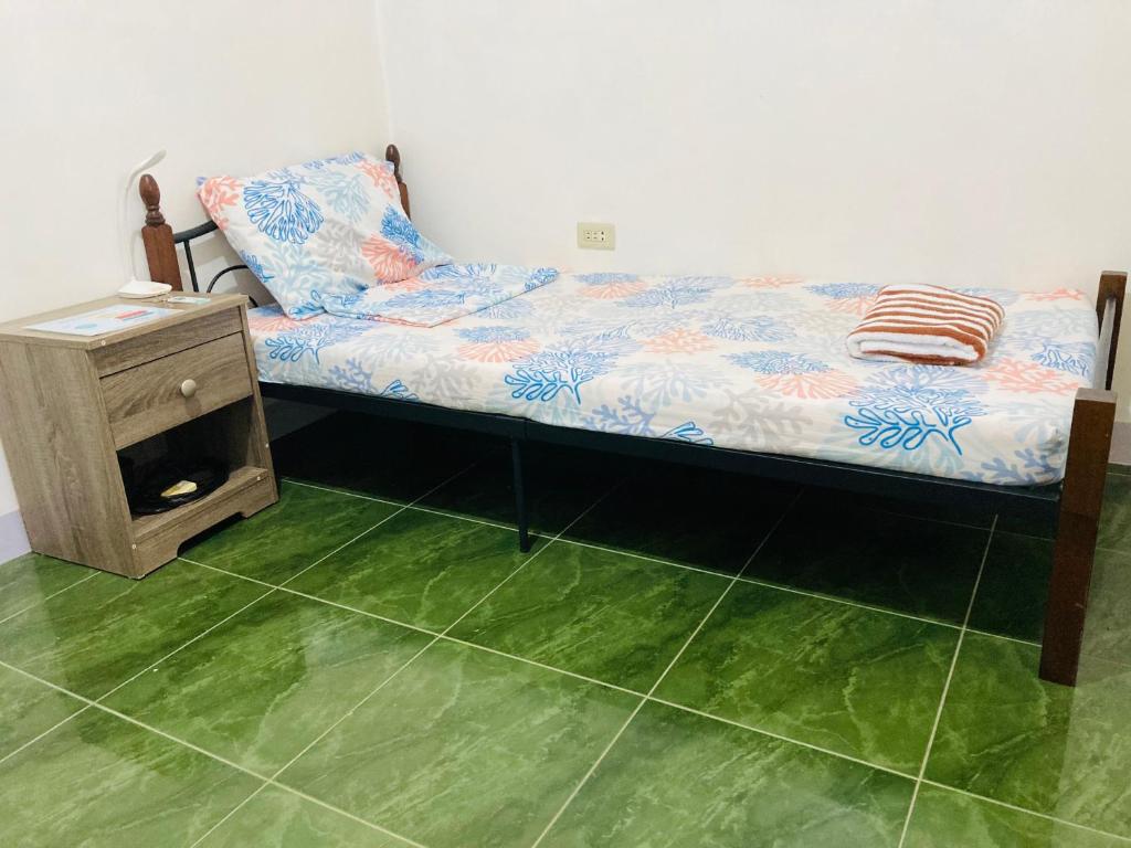 Postel nebo postele na pokoji v ubytování Olympia Travellers INN