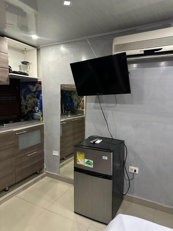 Kuchyň nebo kuchyňský kout v ubytování tocore suites beach
