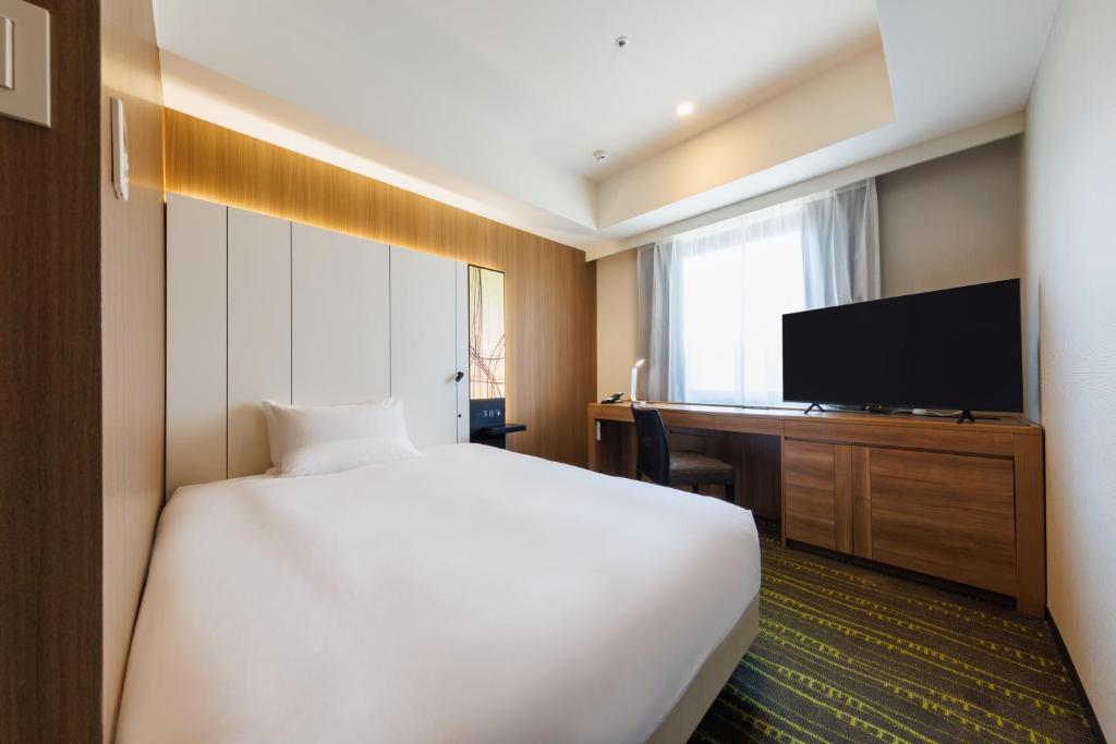 TV a/nebo společenská místnost v ubytování JR-East Hotel Mets Shibuya