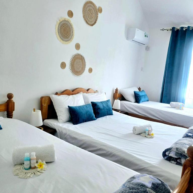 Postel nebo postele na pokoji v ubytování Coco Haven Mauritius