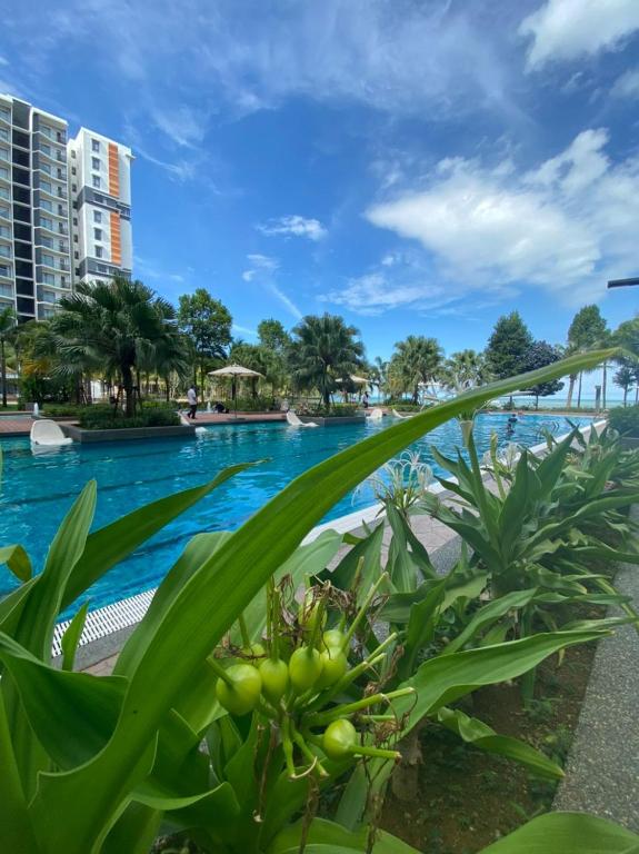 a view of the swimming pool at the resort at EMAS Suite Timurbay, Kuantan in Kuantan