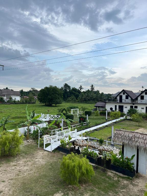 Zahrada ubytování Tok Abah Cottage