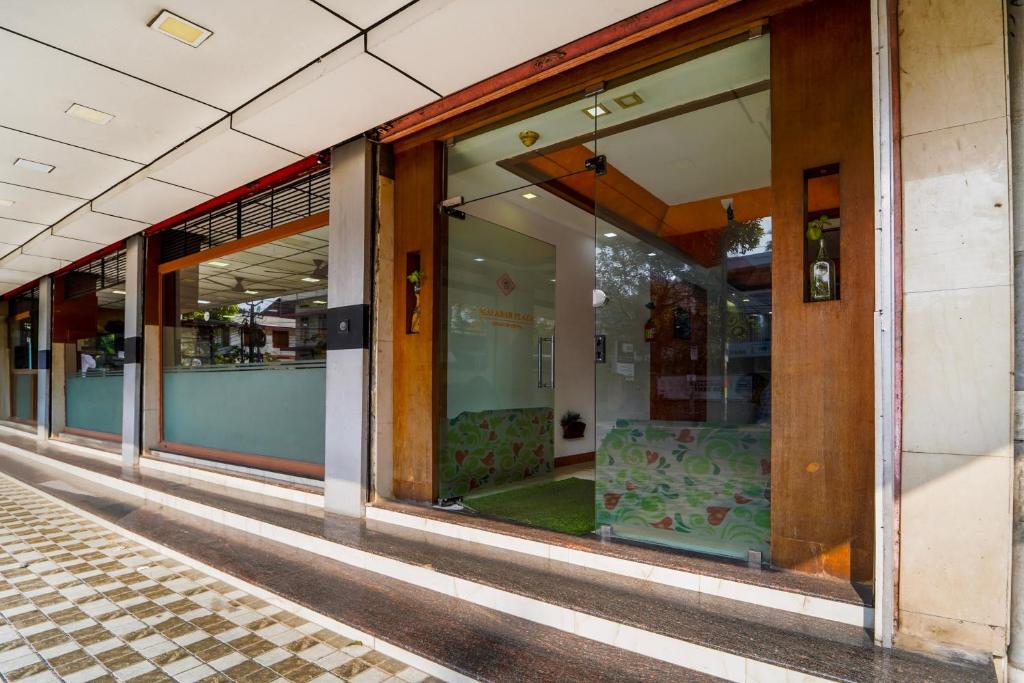 Fotografie z fotogalerie ubytování Super Townhouse City Center Ernakulam v destinaci Ernakulam