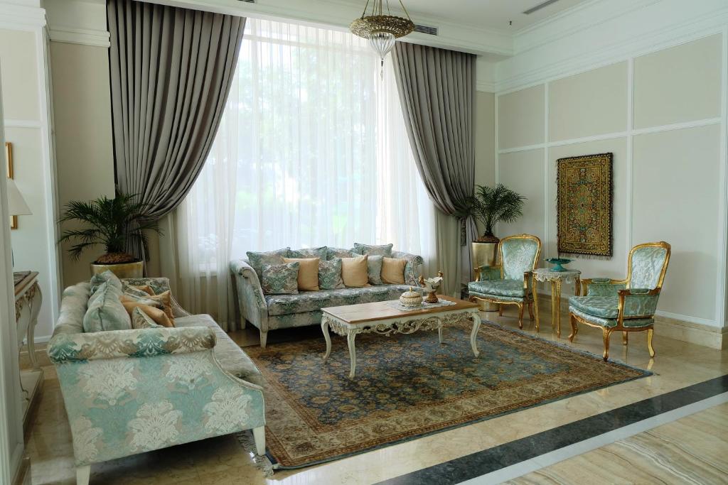 Posezení v ubytování Noor Hotel