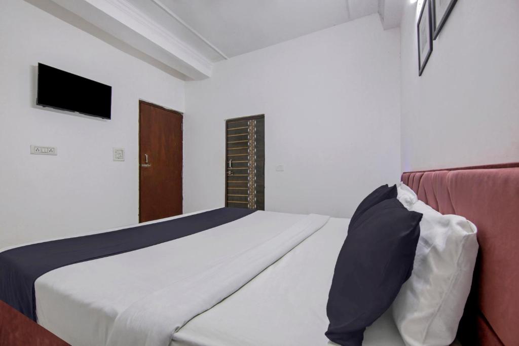 Postel nebo postele na pokoji v ubytování Hotel O Relax Inn