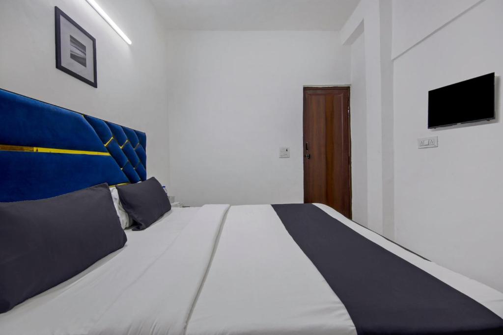 Postel nebo postele na pokoji v ubytování Hotel O Relax Inn