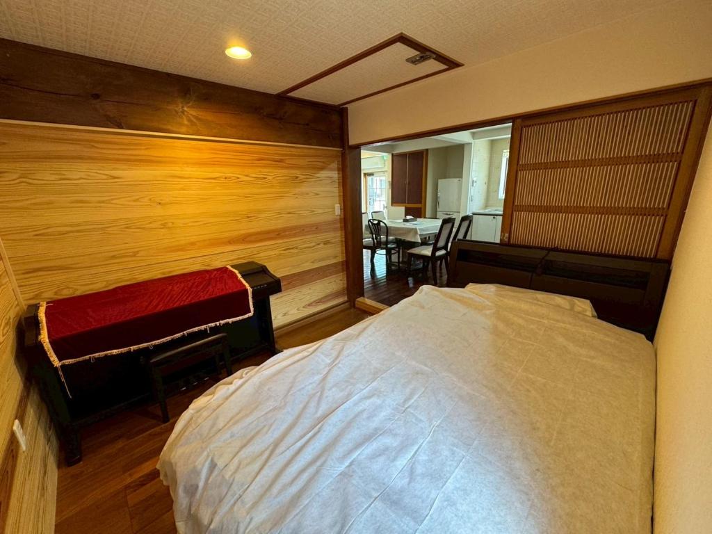 Letto o letti in una camera di 一宿一景一生縁-千葉県市原市小谷田店