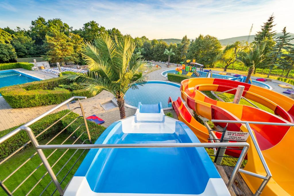 a water slide at a water park at Penzión Aqua Maria in Veľaty