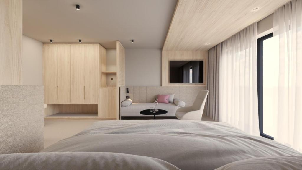 Hotel COSMEA 4 Stars - Your Honeymoon & Dolomites experienceにあるベッド
