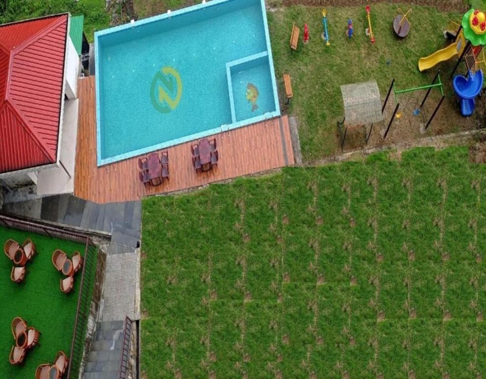 สวนหย่อมนอก Staynest Retreat and Spa Gangtok with Parking & Swimming Pool