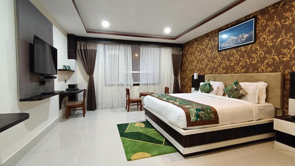 โทรทัศน์และ/หรือระบบความบันเทิงของ Staynest Retreat and Spa Gangtok with Parking & Swimming Pool