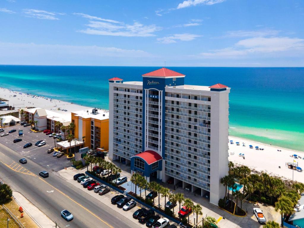 an aerial view of a hotel and the beach at Radisson Beachfront Hotel - Panama City Beach in Panama City Beach