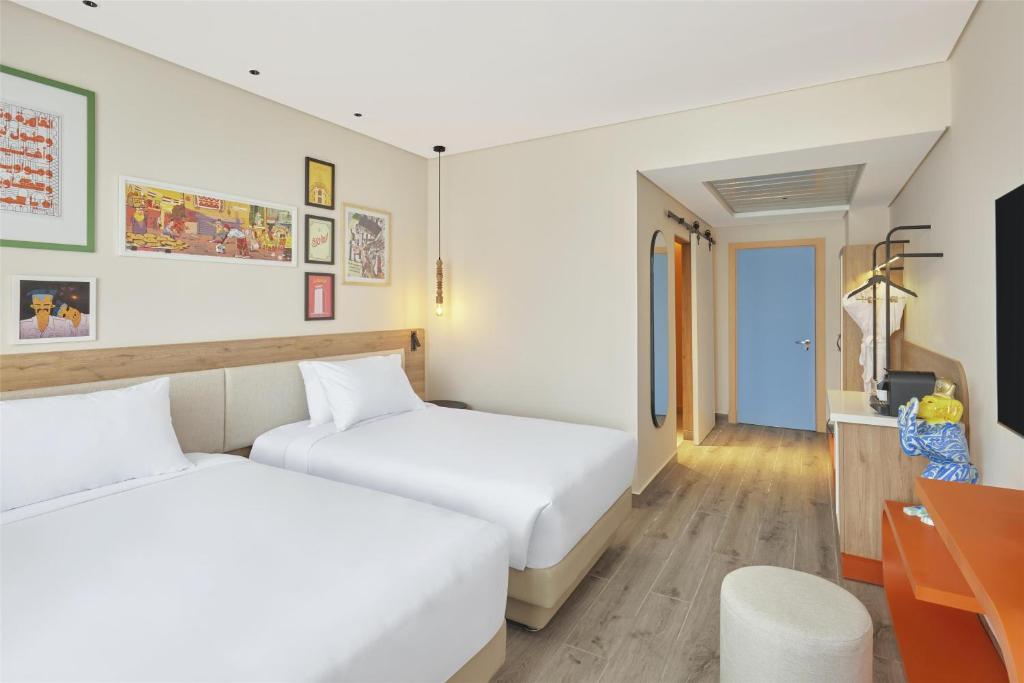 Voodi või voodid majutusasutuse Hyatt Centric Cairo West toas