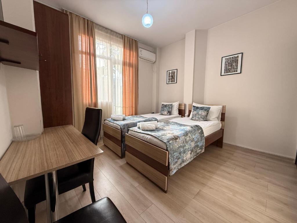 Postel nebo postele na pokoji v ubytování Liva Hotel