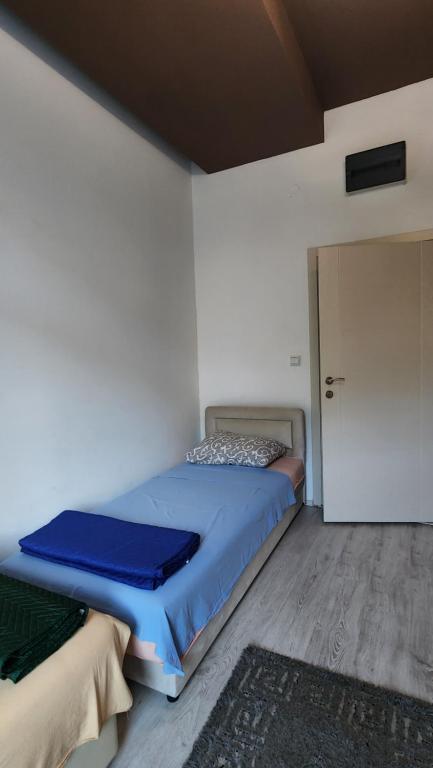 Postel nebo postele na pokoji v ubytování REA Apartmants