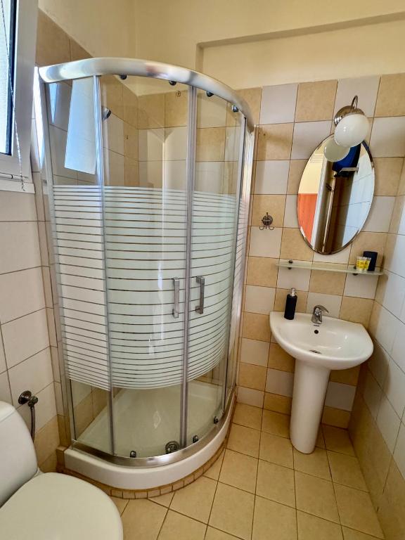 Koupelna v ubytování Dafnes Rooms