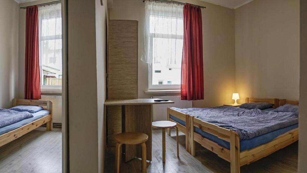 Postel nebo postele na pokoji v ubytování O.W.Cynamon
