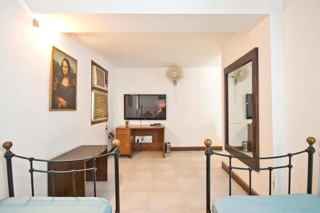 TV a/nebo společenská místnost v ubytování Trendy Bed & Breakfast