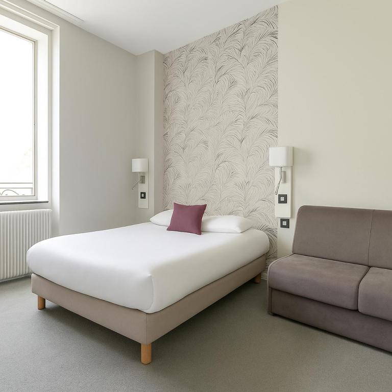 Postel nebo postele na pokoji v ubytování Hôtel Albert Elisabeth Gare SNCF