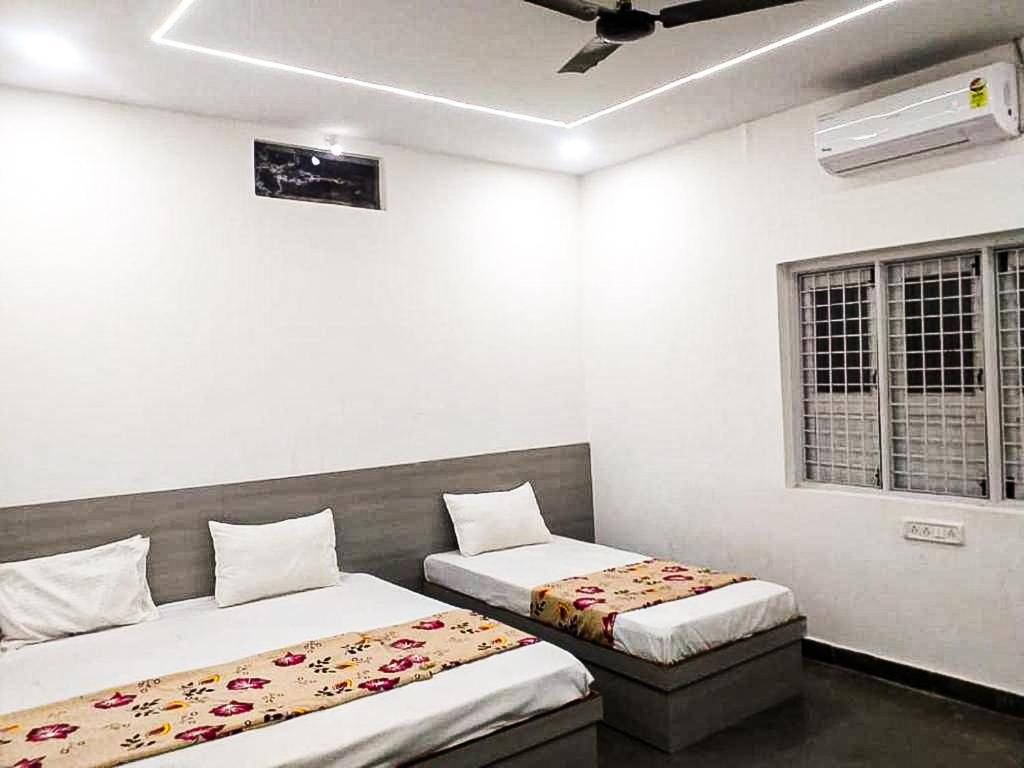 Katil atau katil-katil dalam bilik di Hotel Prem Chaya