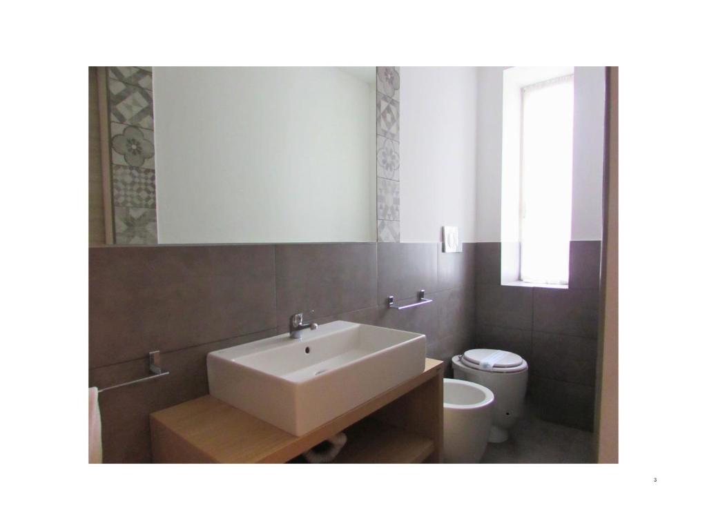 Koupelna v ubytování Hotel Ponte Sassi