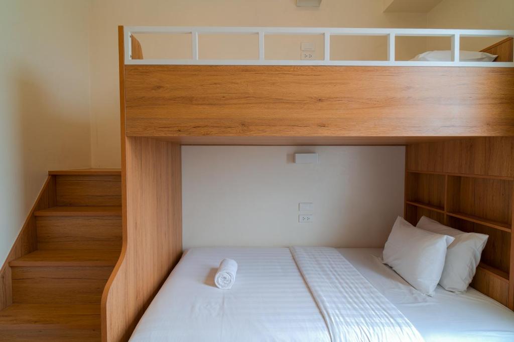 Letto o letti in una camera di MySpace Hotel Comembo Taguig