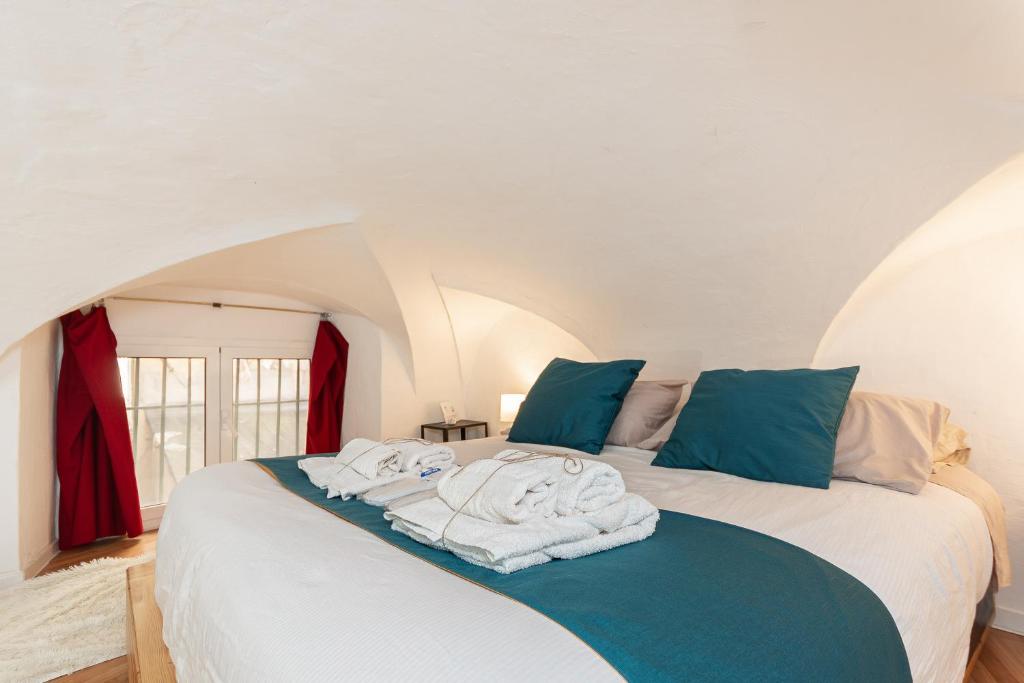 Postel nebo postele na pokoji v ubytování Rifugio storico a 50 passi dal Duomo, Bilocale