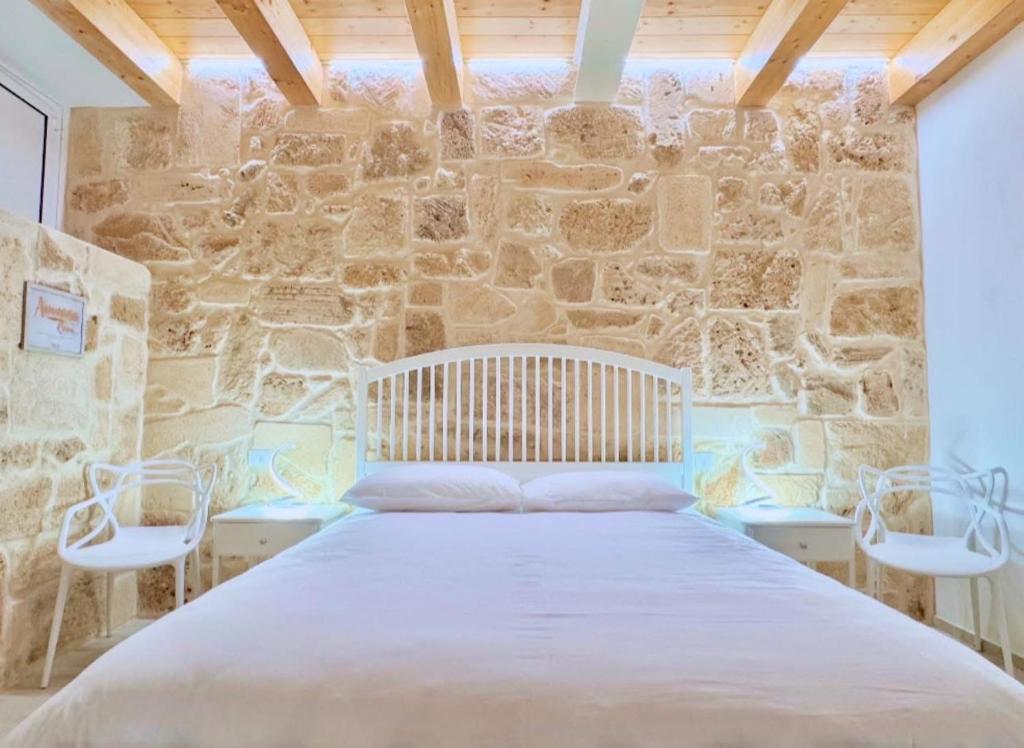 Postel nebo postele na pokoji v ubytování Amurusa Room