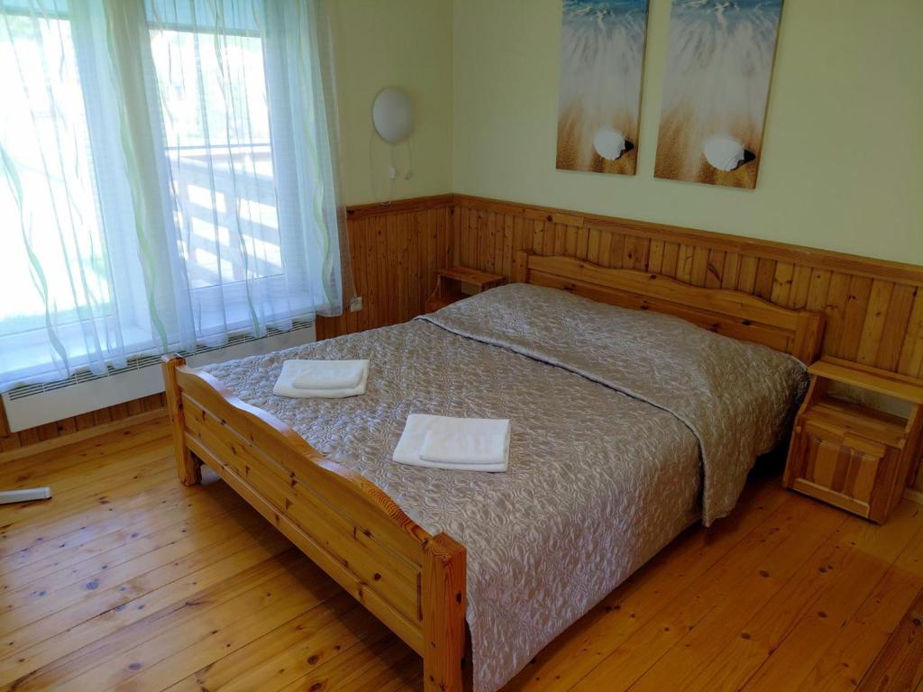 Postel nebo postele na pokoji v ubytování Puhkekeskus SUVI