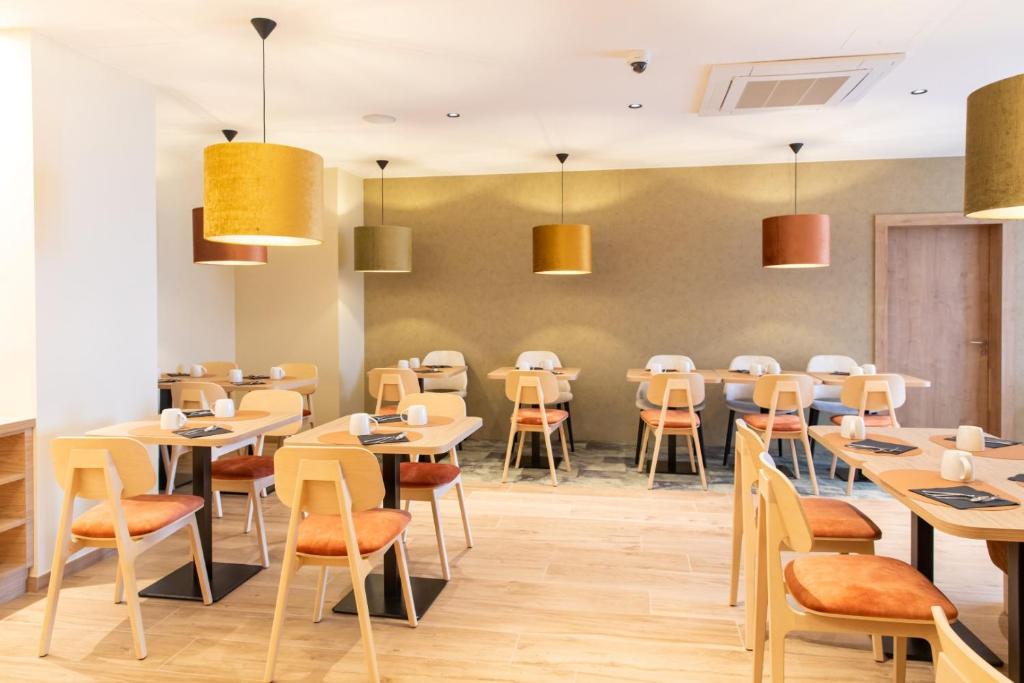 Posezení v ubytování Hôtel Terra Vinum