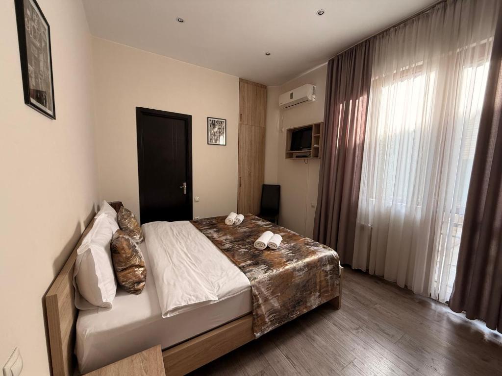 Postel nebo postele na pokoji v ubytování Liva Hotel