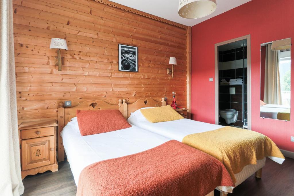 Postel nebo postele na pokoji v ubytování Hôtel La Réserve