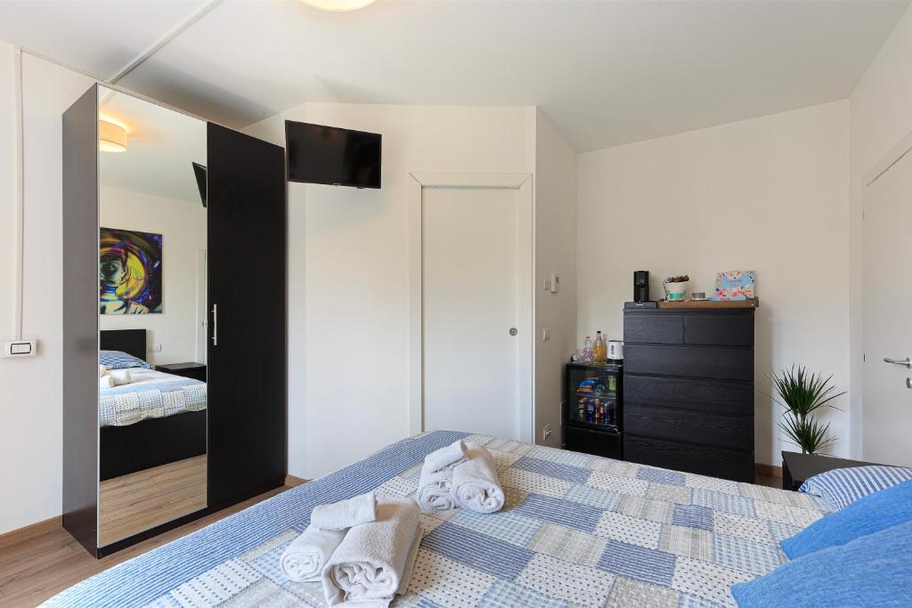 Postel nebo postele na pokoji v ubytování Tata's Room