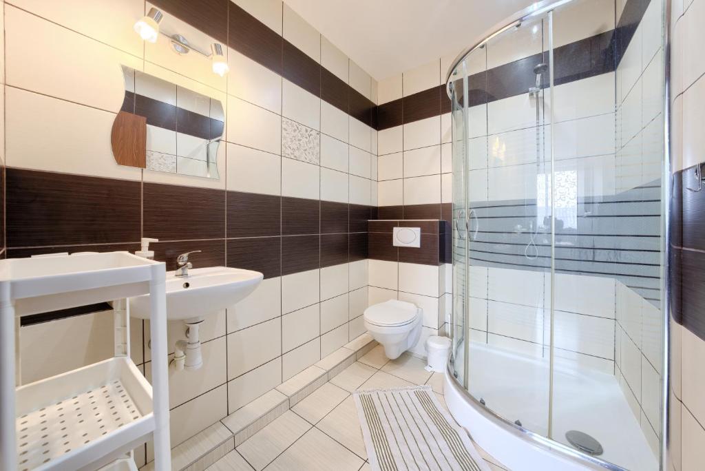 Kúpeľňa v ubytovaní Domki letniskowe i pokoje u Katarzyny