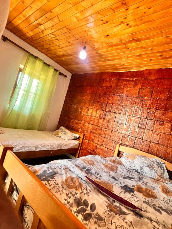 Postel nebo postele na pokoji v ubytování Lekbibaj view