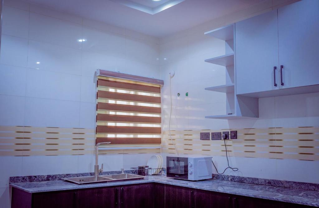 Kuchyň nebo kuchyňský kout v ubytování Hannan Residence