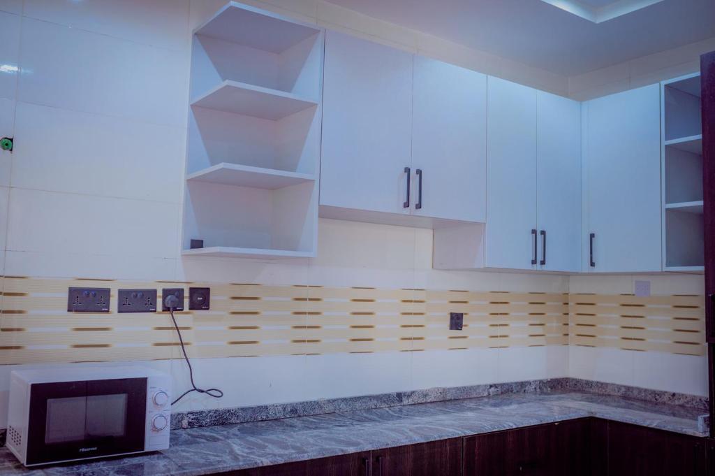 Kuchyň nebo kuchyňský kout v ubytování Hannan Residence