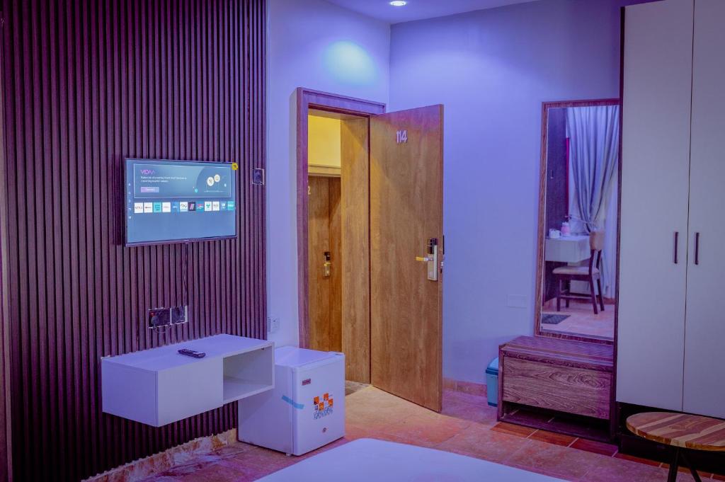 TV a/nebo společenská místnost v ubytování Hannan Residence