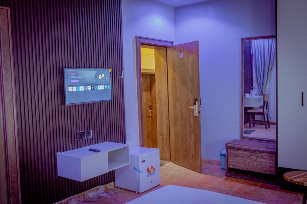 TV a/nebo společenská místnost v ubytování Hannan Residence
